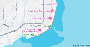 Peaceful beachfront promenade and shallow waters in Sanur, a family-friendly destination on Bali's southeast coast.